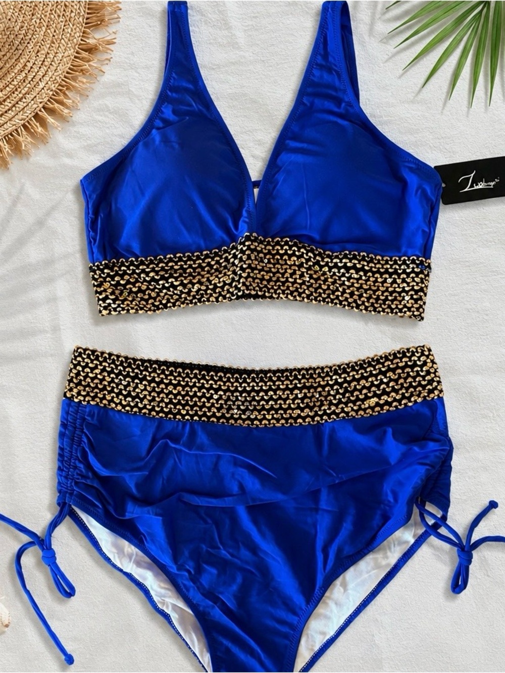Royal blue bathing suit with gold trim
